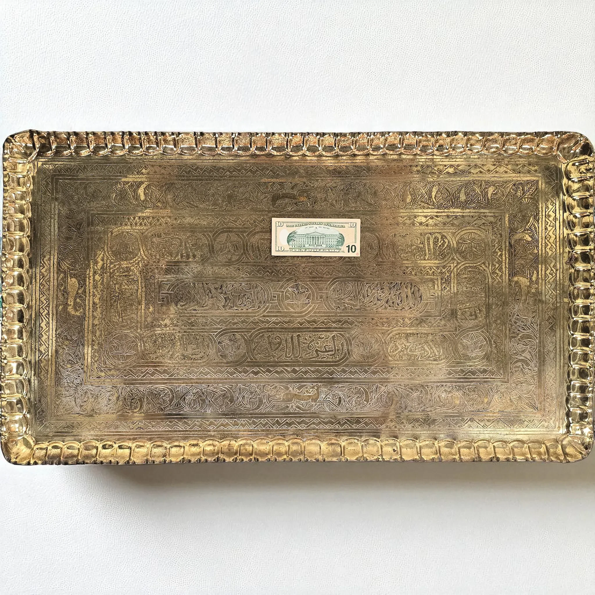 Large Antique Hand-Wrought Islamic Brass Tray, c. 1900–1935: brass, red, antique, antique (close-up detail) - Metalware