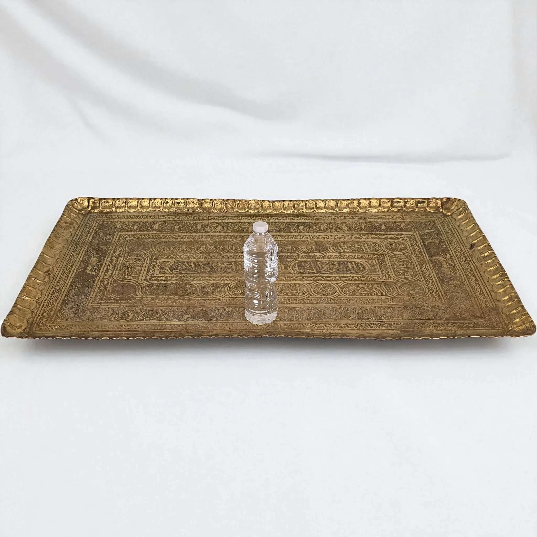 Large Antique Hand-Wrought Islamic Brass Tray, c. 1900–1935: brass, red, antique, antique (side view) - Metalware